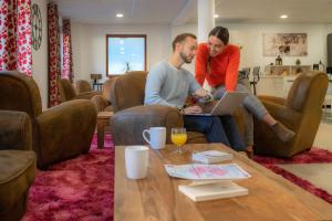 Posezení v ubytování Goélia Les Chalets des Pistes