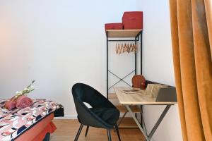 Un ou plusieurs lits dans un hébergement de l'établissement Maison climatisée Gare à 10 min, idéale familles MaisonCarréeConciergerie