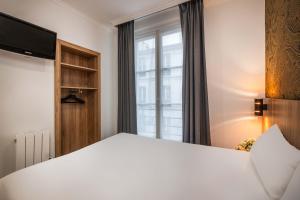 Postel nebo postele na pokoji v ubytování Hotel Daval