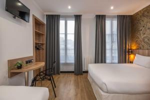 Postel nebo postele na pokoji v ubytování Hotel Daval