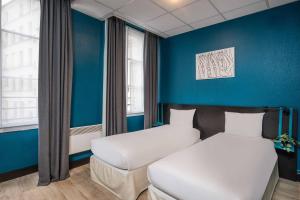 Postel nebo postele na pokoji v ubytování Hotel Daval