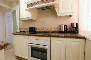Kuchnia lub aneks kuchenny w obiekcie TESS Apartamento Don Miguel