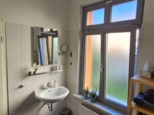 Koupelna v ubytování Ferienwohnung am Stadthafen + 29 fotografií