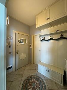 a bathroom with a sink and a toilet in a room at Blue Lake View in Oggebbio