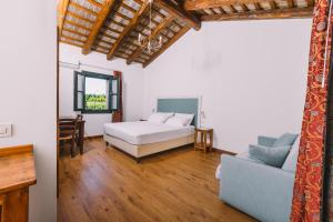 Postel nebo postele na pokoji v ubytování Agriturismo Albafiorita + 37 fotografií