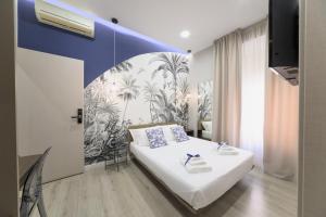 Giường trong phòng chung tại B&B Les Lumières
