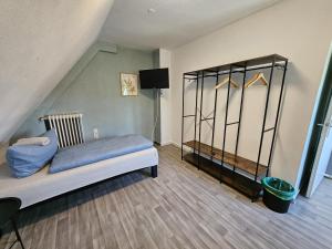 Ένα ή περισσότερα κρεβάτια σε δωμάτιο στο Gästehaus Jungfernkopf