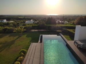 Bazén v ubytování Villa Golf de Mogador - Piscine - Vue mer 180º nebo v jeho okolí + 20 fotografií