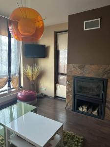 Et tv og/eller underholdning på Luxury Apartment Bansko