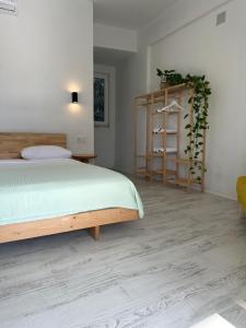 a bedroom with a bed and a book shelf at Blue Eye 5 km from AirPort Dalaman in Dalaman