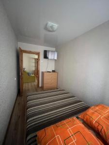 Postel nebo postele na pokoji v ubytování Buto nuoma Palangos centre