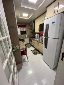 Afbeelding uit fotogalerij van Apartamento Paraiso Litoral in São Pedro da Aldeia +16 foto's