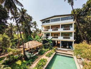 Πισίνα στο ή κοντά στο Nalanda Retreat Goa By Mandrem Beach
