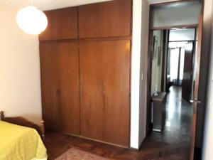 Ένα ή περισσότερα κρεβάτια σε δωμάτιο στο Casa familiar céntrica +21 φωτογραφίες