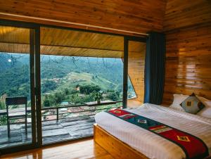 Postel nebo postele na pokoji v ubytování H'Mong Cát Cát Homestay