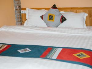 Postel nebo postele na pokoji v ubytování H'Mong Cát Cát Homestay
