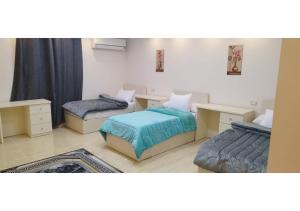 Postel nebo postele na pokoji v ubytování فندق سكن