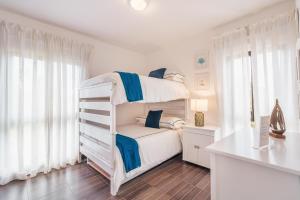 Ένα ή περισσότερα κρεβάτια σε δωμάτιο στο Unique gem penthouse in playa bonita