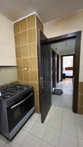 Ένα ή περισσότερα κρεβάτια σε δωμάτιο στο Super Elite apartment Nile View F6