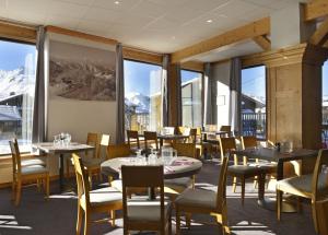 Restoran atau tempat lain untuk makan di Hôtel Club mmv Les Arolles ****