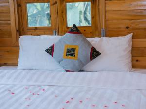 Postel nebo postele na pokoji v ubytování H'Mong Cát Cát Homestay