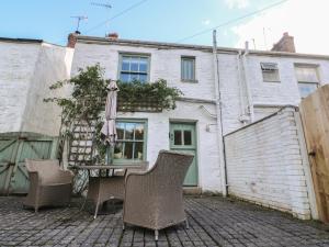 Posezení v ubytování Apple Tree Cottage