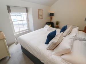 Postel nebo postele na pokoji v ubytování Apple Tree Cottage