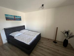 Postel nebo postele na pokoji v ubytování Ferienwohnung Bad Sulza