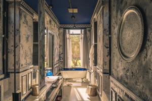 Salle de bains dans l'établissement The Source Hotel Music & Spa