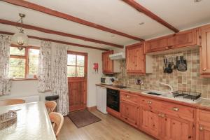 Nhà bếp/bếp nhỏ tại Vine Cottage +15 ảnh