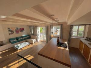 a living room with a couch and a table at Stone House Orsera in Vrsar