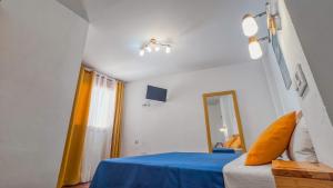 Postel nebo postele na pokoji v ubytování La Tortuga Lodging Rooms