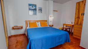 Postel nebo postele na pokoji v ubytování La Tortuga Lodging Rooms
