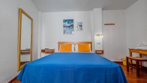 Postel nebo postele na pokoji v ubytování La Tortuga Lodging Rooms