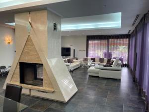 TV a/nebo společenská místnost v ubytování Villa las palmeras