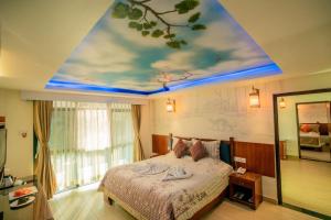Voodi või voodid majutusasutuse Hotel Jungle Crown toas