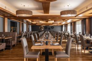 Reštaurácia alebo iné gastronomické zariadenie v ubytovaní Ravelli Sporting
