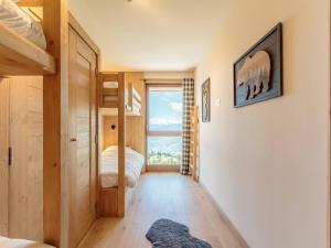 Ένα ή περισσότερα κρεβάτια σε δωμάτιο στο Duplex 4 étoiles avec Piscine, SPA, et Accès Pistes - 10 pers, 92 m², 3 ch + Coin Montagne - FR-1-461A-20 +26 φωτογραφίες