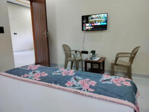 TV a/nebo společenská místnost v ubytování Blue Bell Homestay