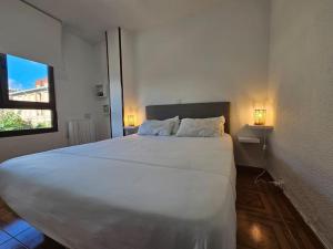 Ένα ή περισσότερα κρεβάτια σε δωμάτιο στο C09A02 Apto Playa y Garaje