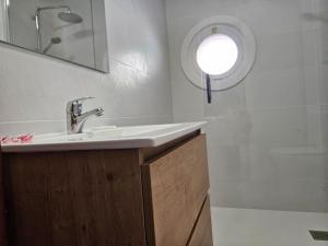 Ένα μπάνιο στο C09A02 Apto Playa y Garaje