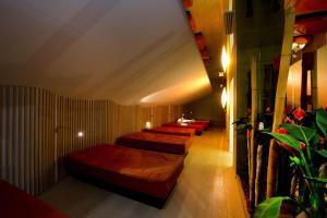 Postel nebo postele na pokoji v ubytování Family & Wellness Hotel Fontana