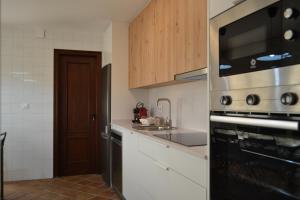 Køkken eller tekøkken på SunShine Paseo de la Victoria