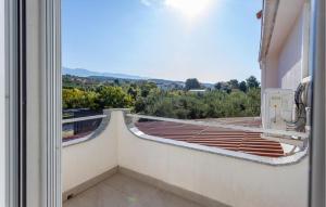 a view from the balcony of a house at 2 Bedroom Awesome Apartment In Barbat in Barbat na Rabu