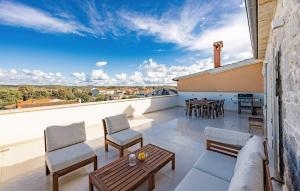 Balkón nebo terasa v ubytování Lovely Home In Funtana With Wifi + 20 fotografií