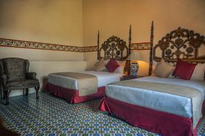 Voodi või voodid majutusasutuse Hotel Montecillo toas