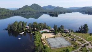 an aerial view of a resort on a lake at Suite with mountains view & Resort access in Lac-Superieur