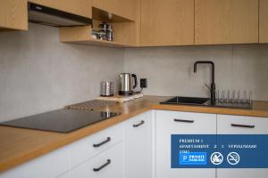 Kuchyňa alebo kuchynka v ubytovaní Premium Apartment with free private parking