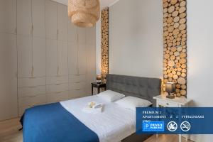 Posteľ alebo postele v izbe v ubytovaní Premium Apartment with free private parking