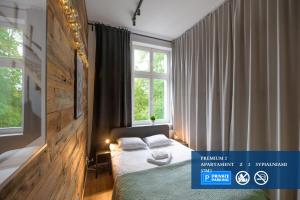 Posteľ alebo postele v izbe v ubytovaní Premium Apartment with free private parking